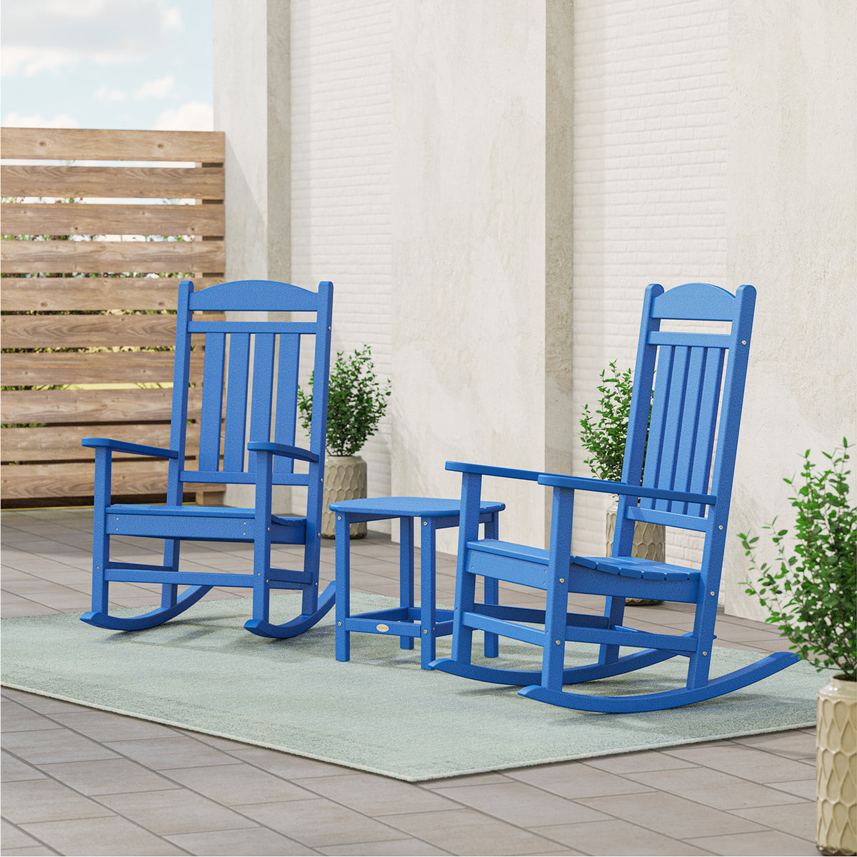 Lifestyle photo of the POLYWOOD Presidential 3-Piece Rocking Chair Set with 18" South Beach Side Table in Pacific Blue