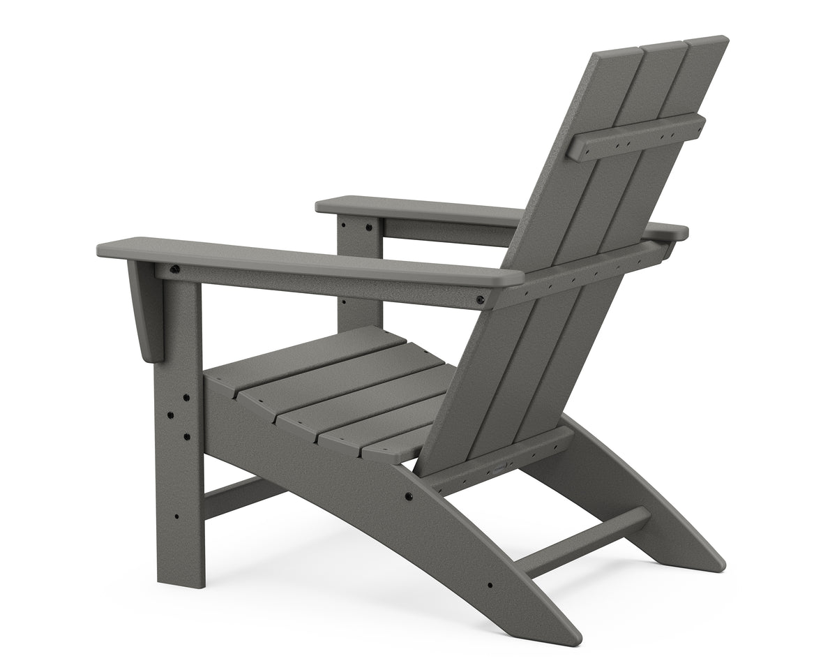 Angled view of the POLYWOOD Modern Adirondack Chair in Slate Grey
