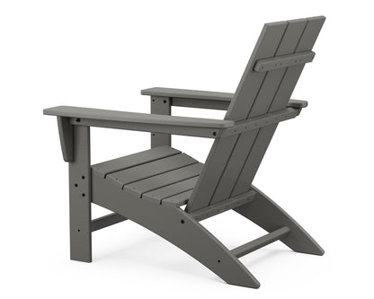Angled view of the POLYWOOD Modern Adirondack Chair in Slate Grey
